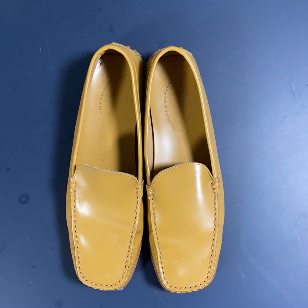 Tod’s tan leather loafers